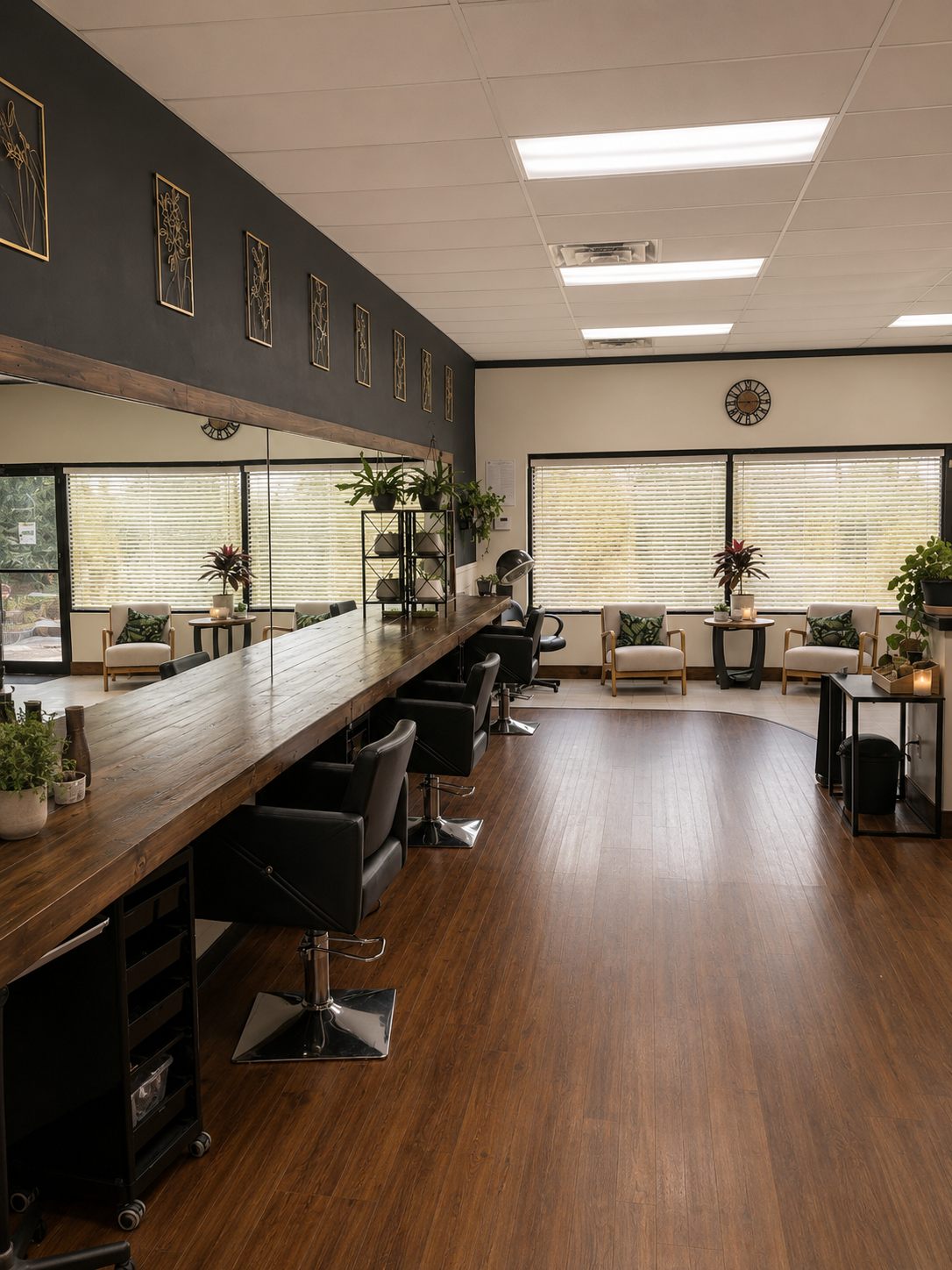 Rejuvenation's sunlit styling suite, with a live-edge wood station, mirrored wall, and botanical touches throughout
